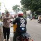 PT Pos Property Indonesia, membagikan ratusan paket takjil. PJ/Mal
