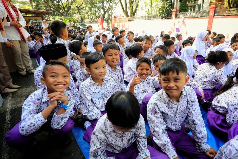 Tampak keceriaan di wajah para murid SDN 121 Caringin Holis saat Hari Pertama Sekolah. PJ/Dok