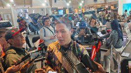 Pius Wirawan saat memberikan keterangan terkait motor listrik Tyranno. PJ/Mal